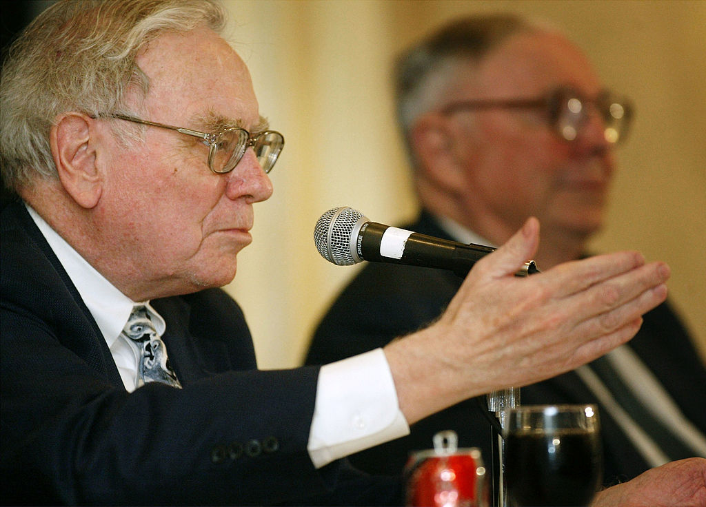 9 Warren Buffett Quotes for Investors to Live By Close up of Warren Buffett speaking in mic