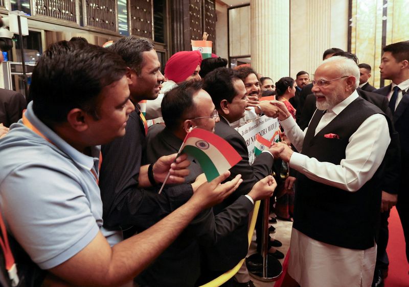 India committed to improving ties with China, Modi tells Xi