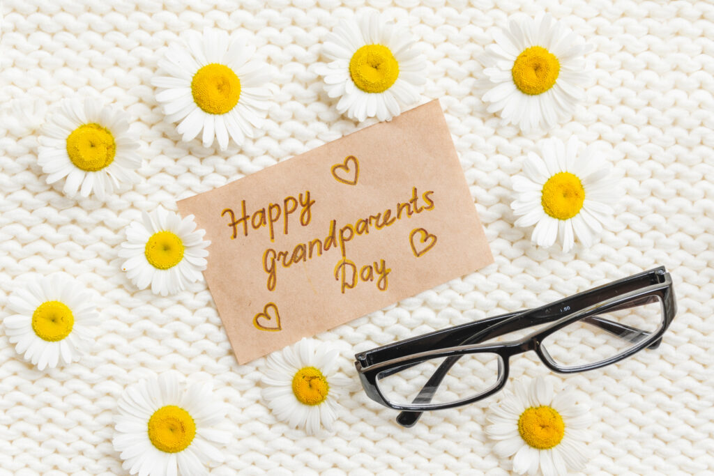 Note that says "Happy Grandparents Day" with glasses and daisies