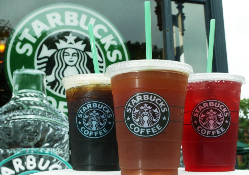 Did My Over $50,000 Starbucks Habit Brew Up a Retirement Savings Disaster? WASHINGTON - JULY 2: Starbucks' new iced coffee and tea beverages are displayed during a promotion July 2, 2003 outside a Starbucks coffee shop at Dupont Circle in Washington, DC. Starbucks introduced a new line of iced tea, coffee and tea lemonade drinks to their customers to cool down in the summer. (Photo by Alex Wong/Getty Images)